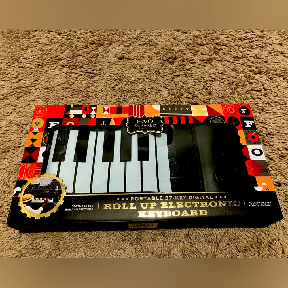 FAO Schwarz roll up electric keyboard